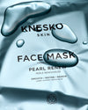 Knesko face mask packaging with water droplets on