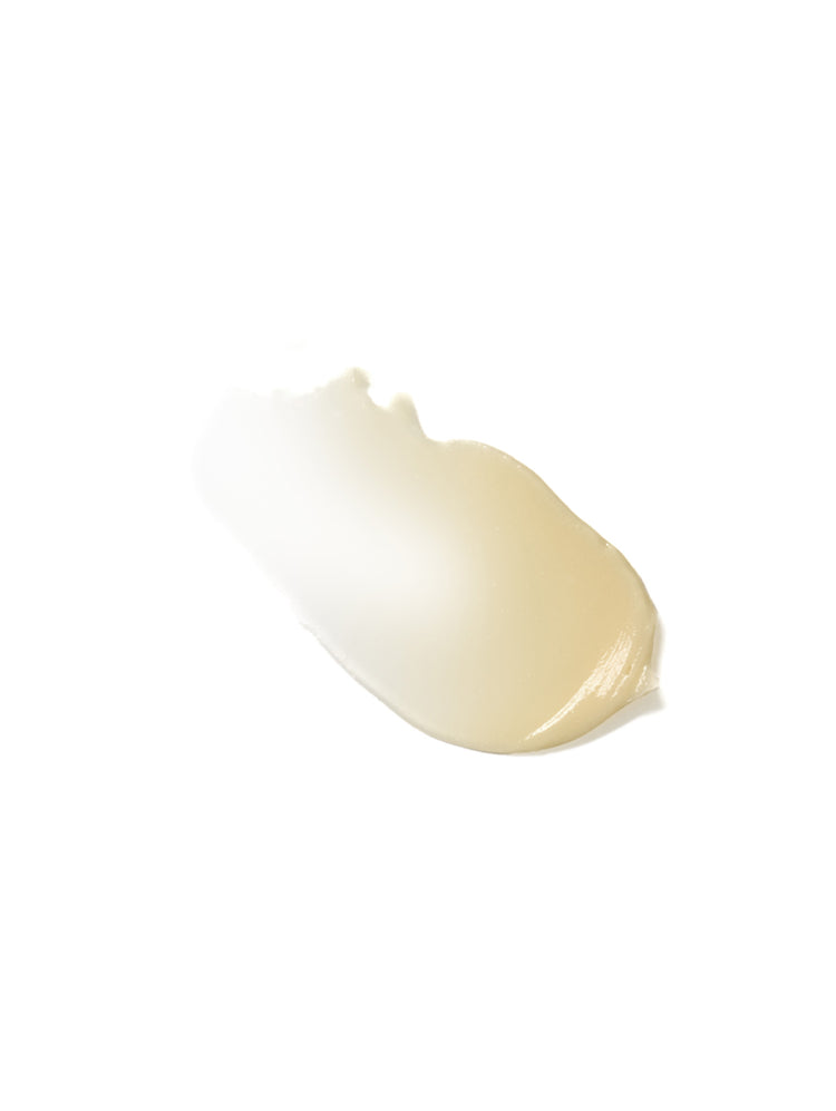 Close-up of a beige cream swatch on a white background