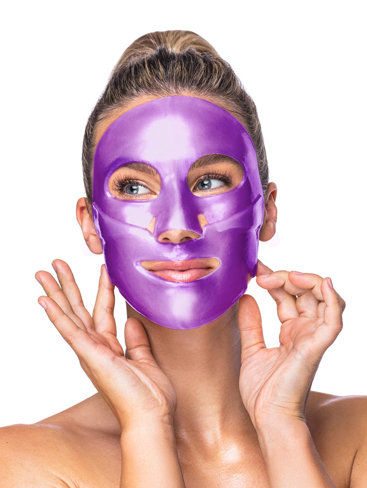 Woman wearing a purple face mask against a white background
