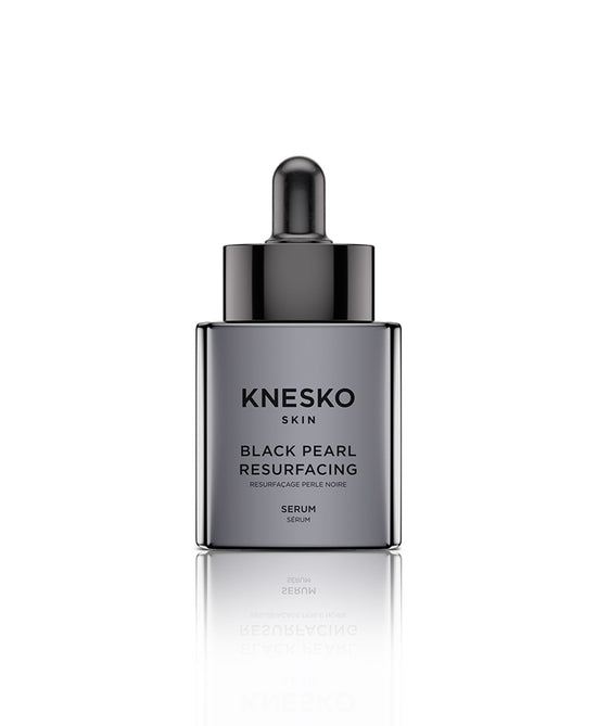 Black pearl serum bottle on a white background