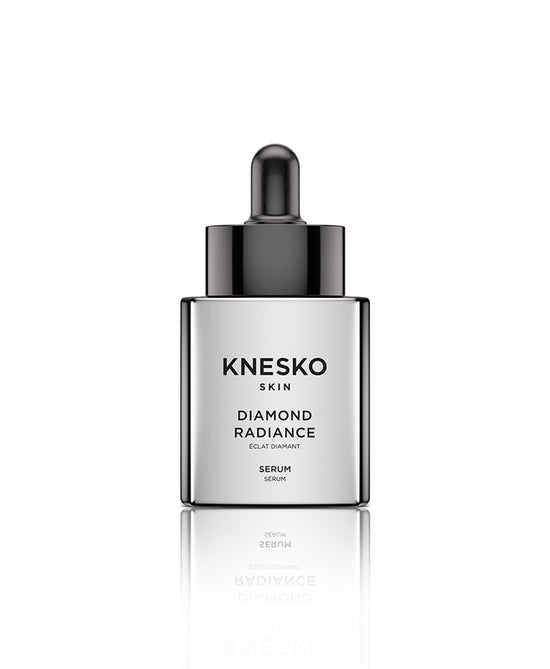 Diamond radiance serum bottle on a white background