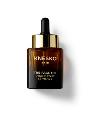 Knesko skin face oil bottle on a white background