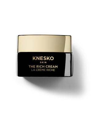 Knesko The Rich Cream jar with gold lid on a white background