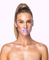 A woman using a Diamond Radiance Lip Mask.