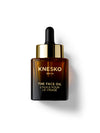Knesko face oil bottle on a white background