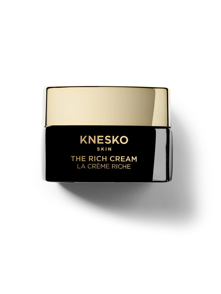 Knesko The Rich Cream jar with gold lid on a white background