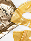 Knesko gold face mask packaging on a white background