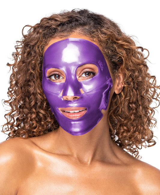 A woman using the Amethyst Hydrate Face Mask.