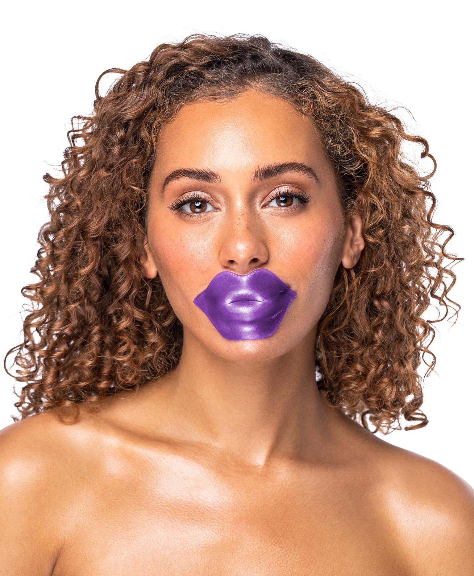 A woman using an Amethyst Hydrate lip mask.
