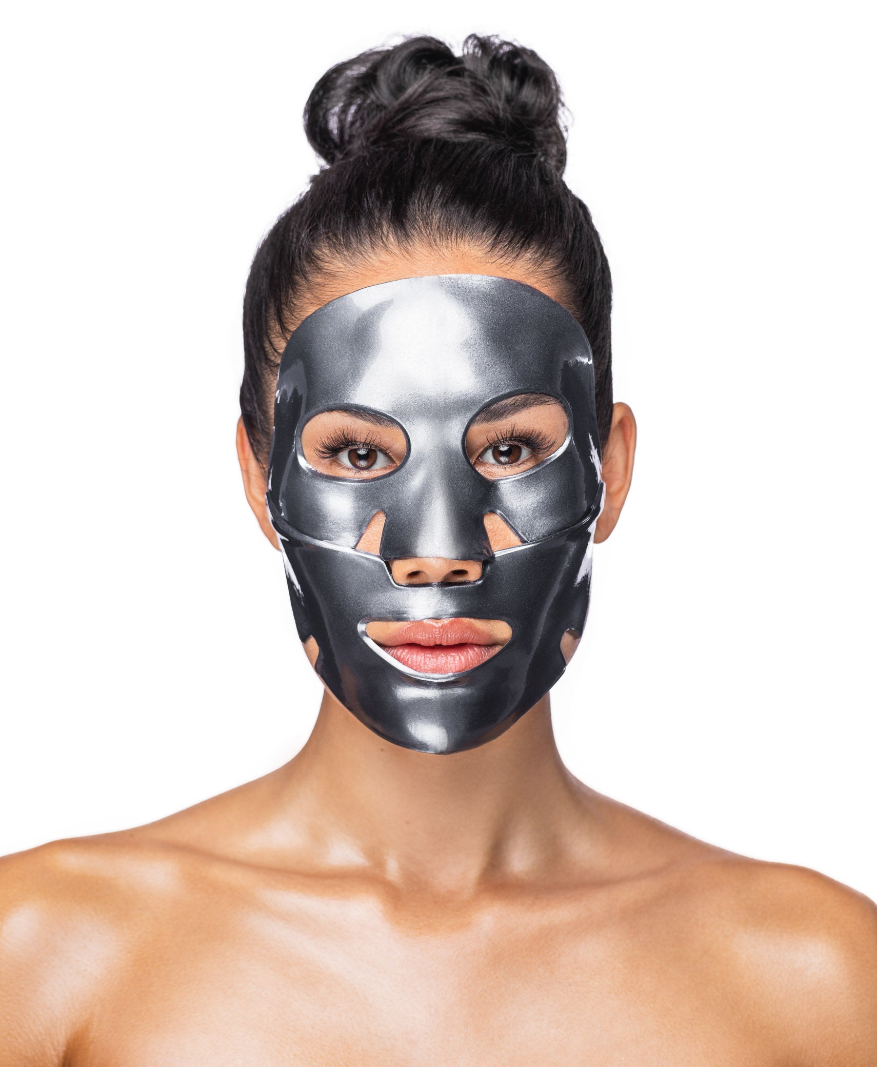 A woman using a Black Pearl Detox Collagen Face Mask.