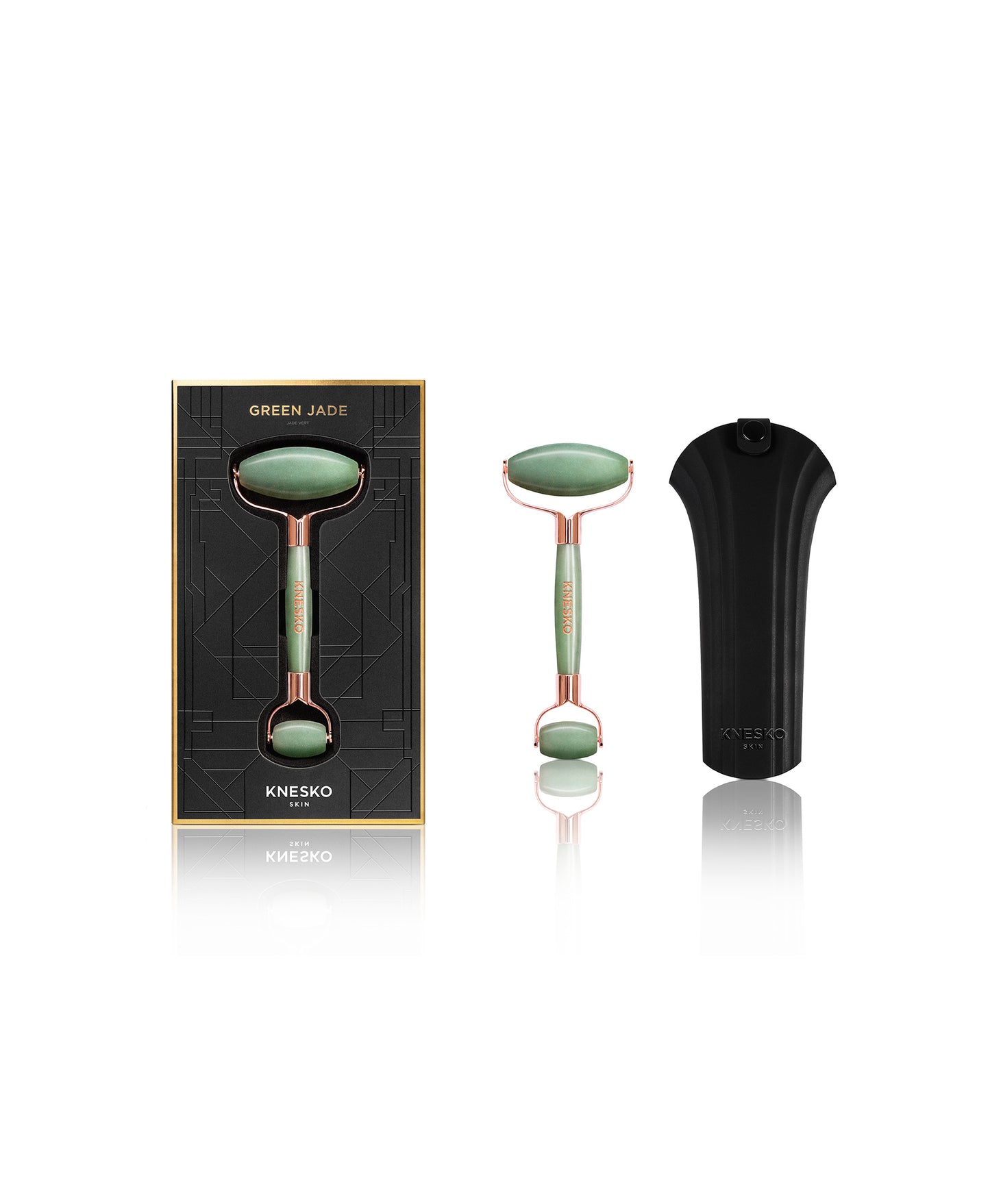 Green Jade Gemstone Roller in a box and a rubber.
